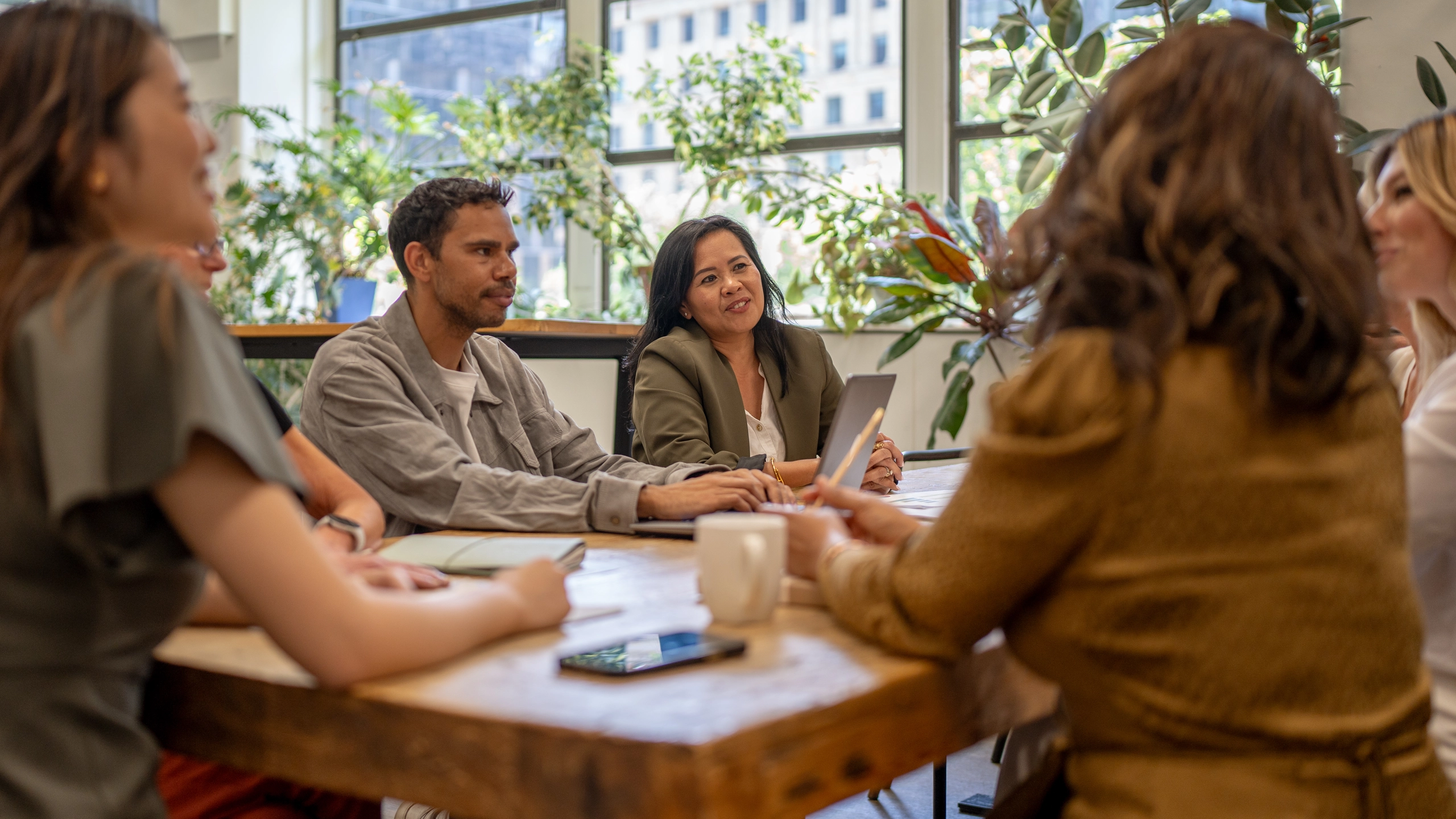 Diverse group of people in a meeting room