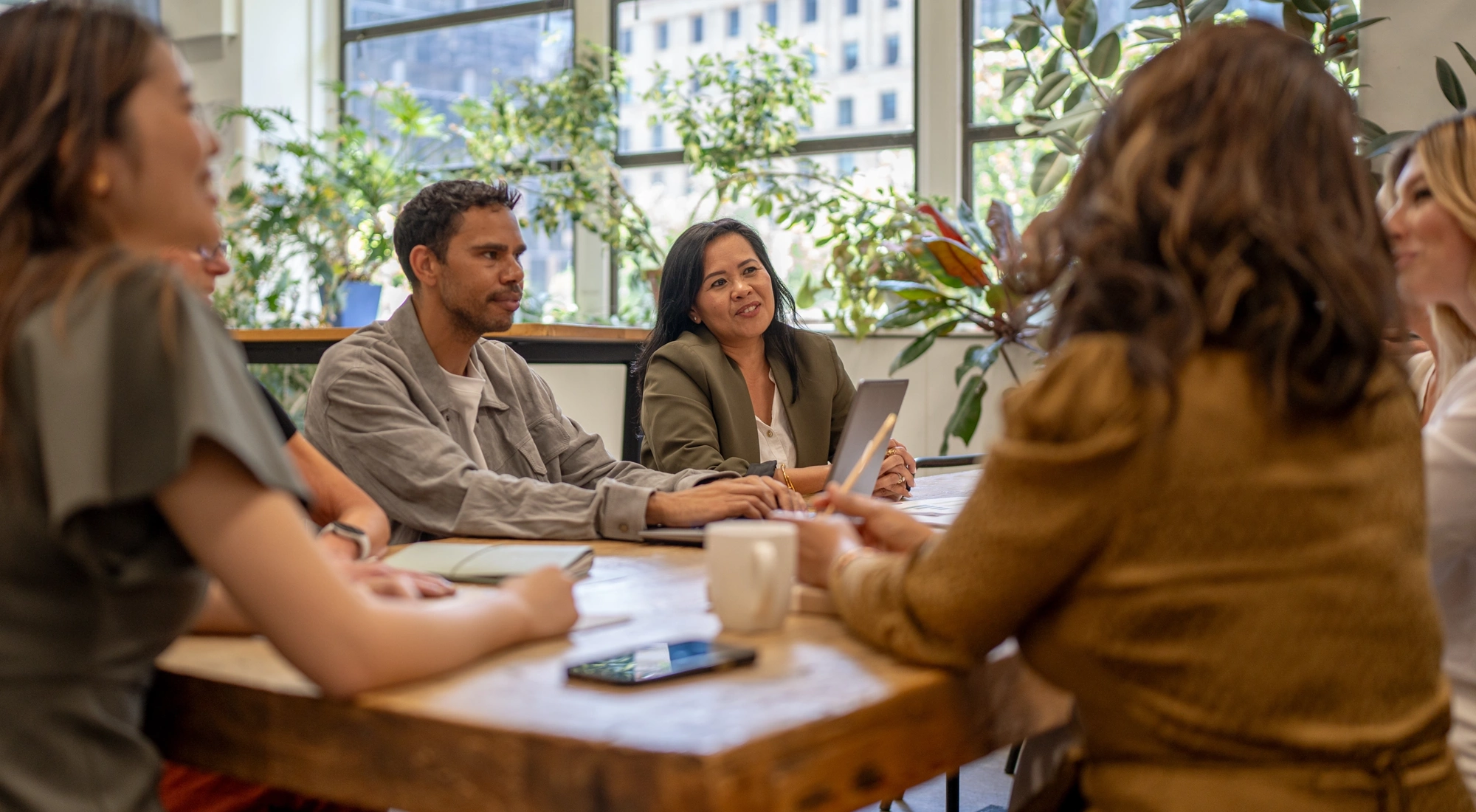 Diverse group of people in a meeting room