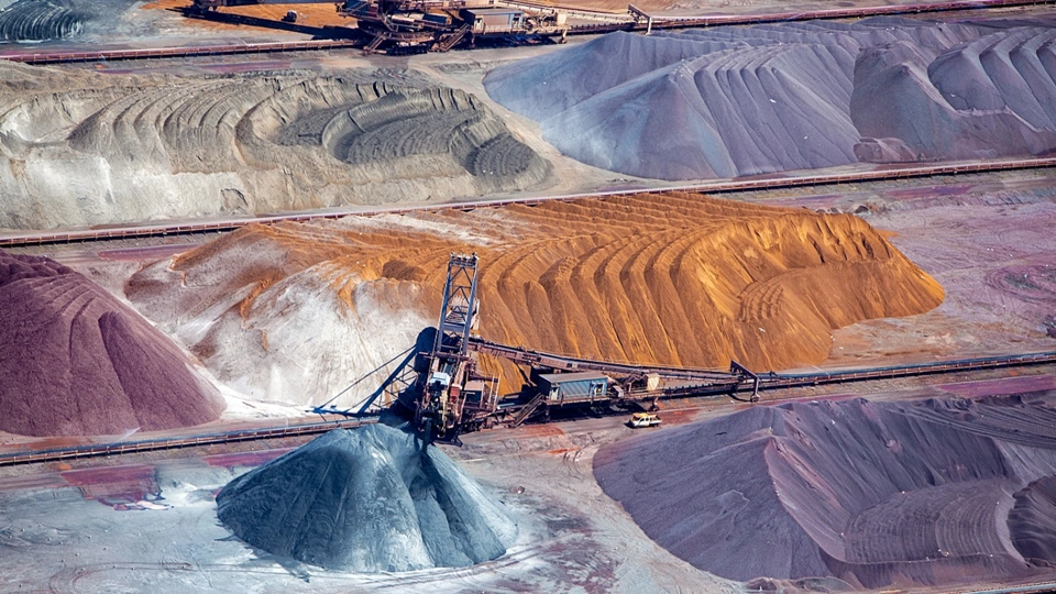 Construction site on colourful sandy mountains