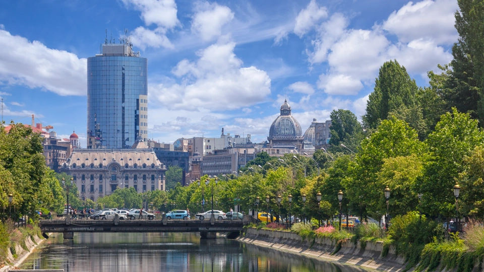 Bucharest. View towards the Dambovita river, in the background among other buildings, the tall financial plaza building and the roof of the CEC palace.