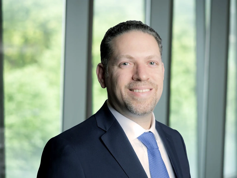 Profile picture of professional male in a suit and tie