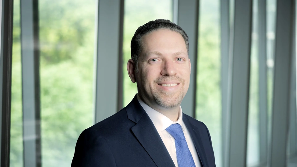 Profile picture of professional male in a suit and tie