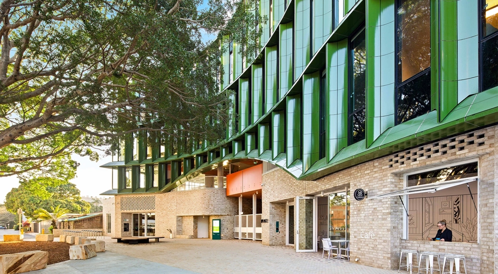 The exterior of Yarrila Place with modern green panelling, New South Wales, Australia
