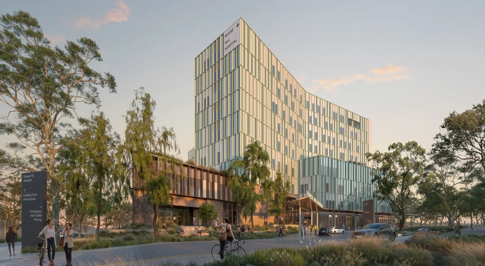 Architectural rendering of a modern multi-storey glass office building of a curved facade, set within landscaped greenery. People are walking and cycling, with trees surrounding the entrance.