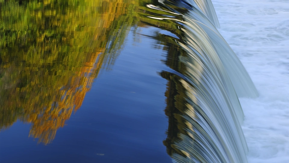 Water flowing over a weir