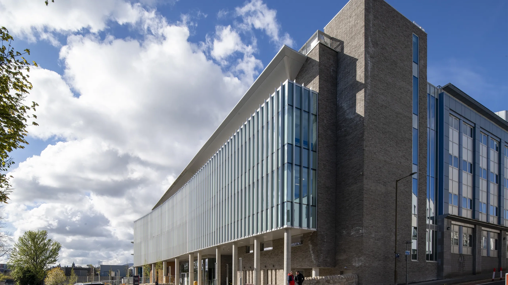 Edinburgh Institute of Genetics and Cancer building, with blue skies and cloads.