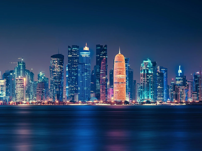 Futuristic Modern Skyline with Reflection in the Still Corniche Bay Waters, Last of the Sunlight Falling on the Buildings.