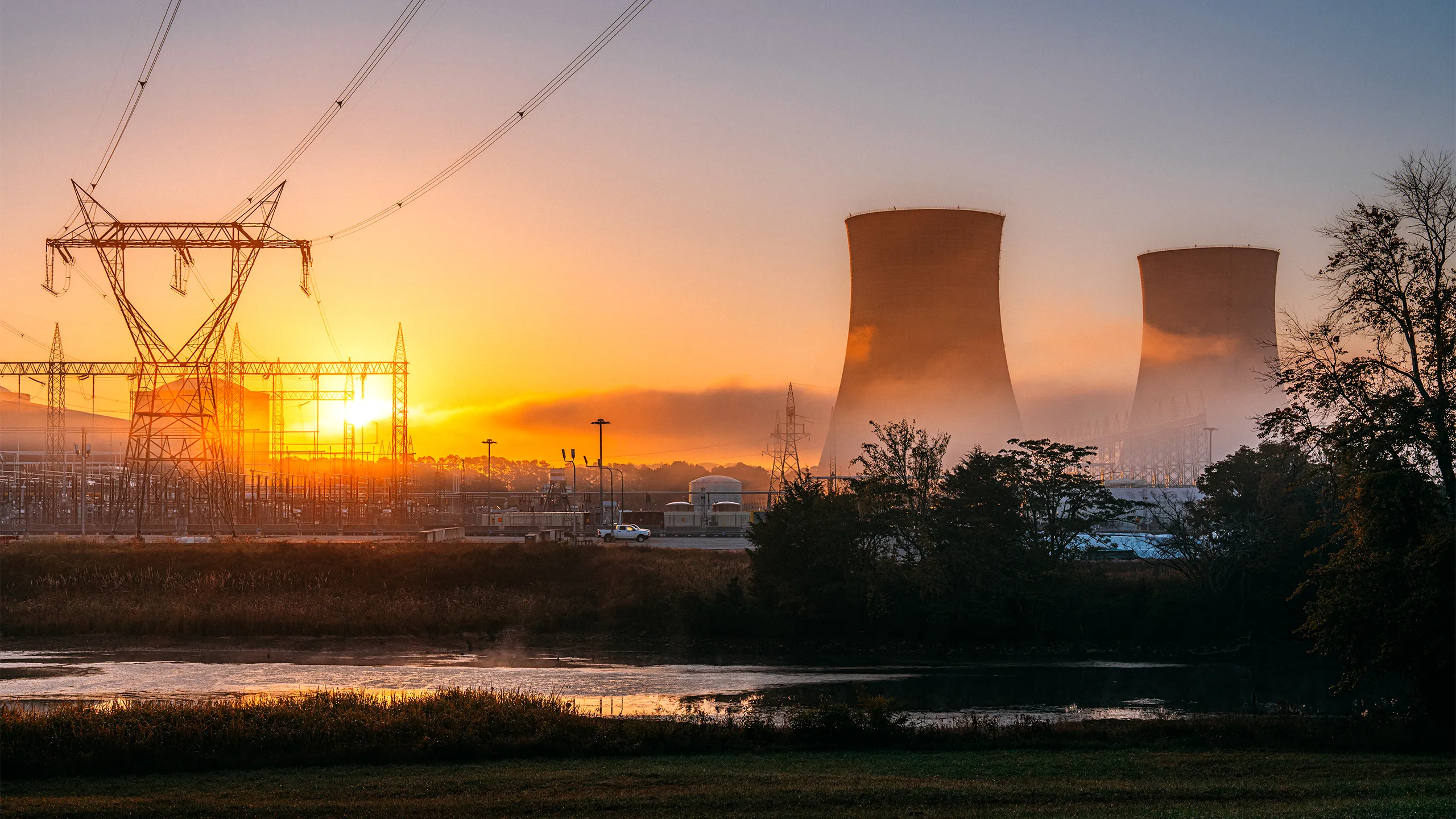 Vibrant Colored Image of two cooling towers of a nuclear power facility in Tennessee, USA on a Sunny Autumn Day. A facility like this creates jobs for the local economy, provides carbon-free electricity to the region, and reduces greenhouse gas emissions.